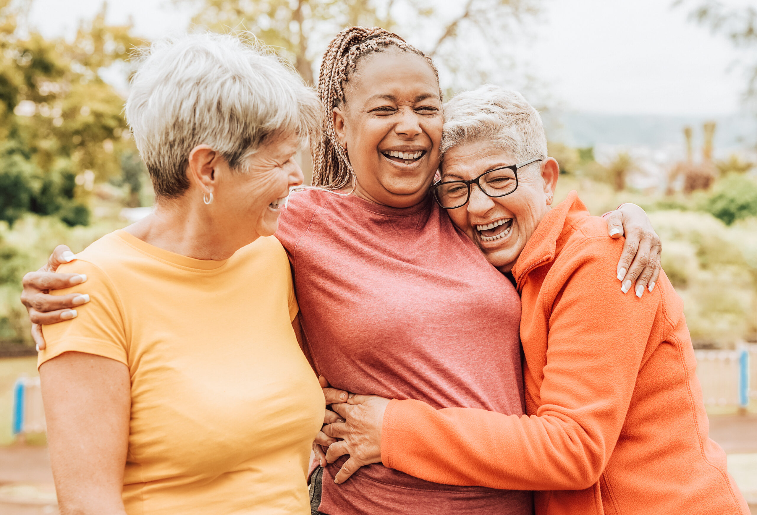 Happy multiracial senior women having fun together outdoor Happy multiracial senior women having fun together outdoor